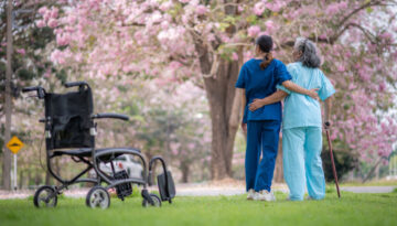 long-term care nurse with elderly woman